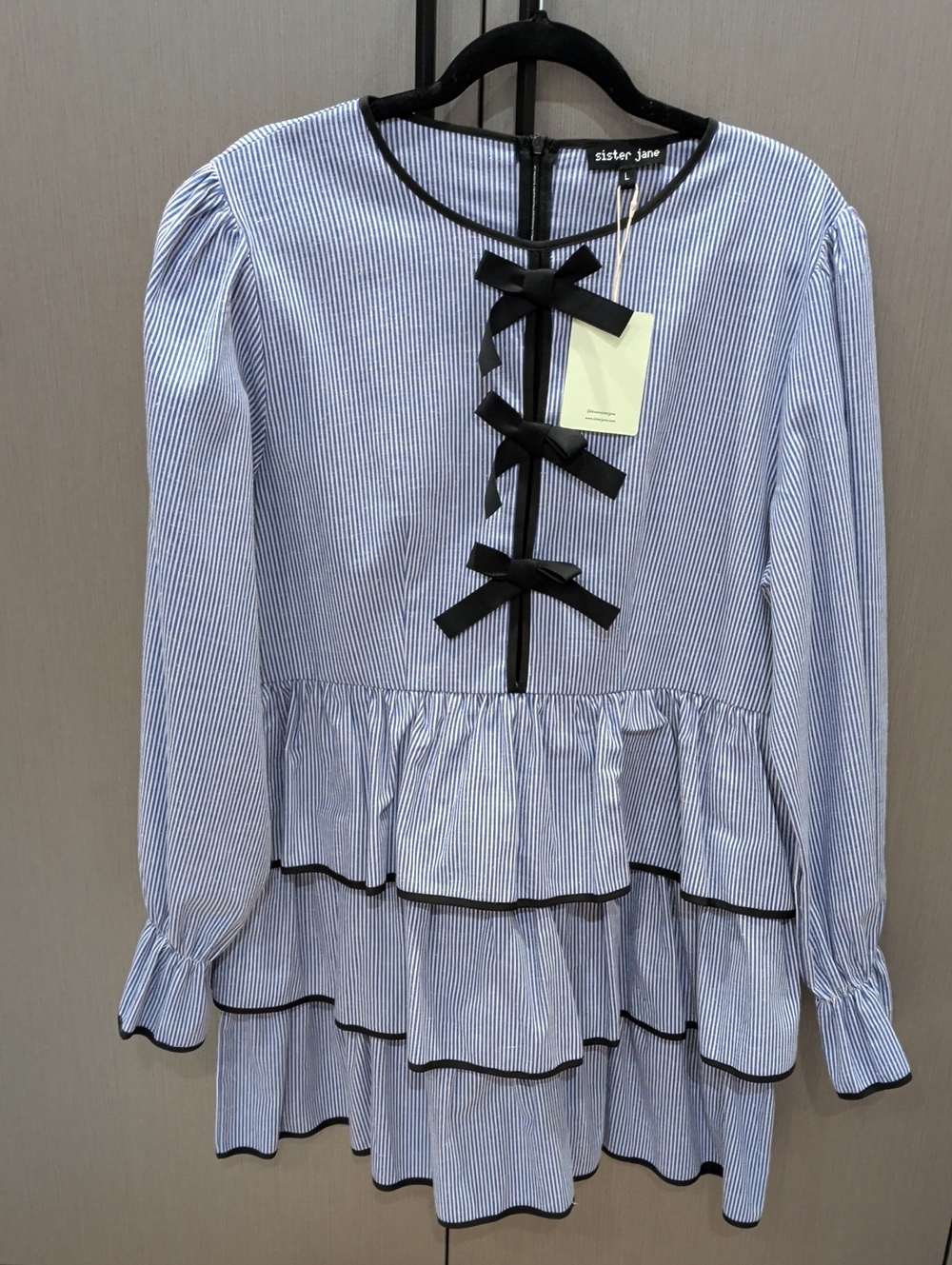 Sister Jane blue and white striped peplum tunic with black bow trim NWT